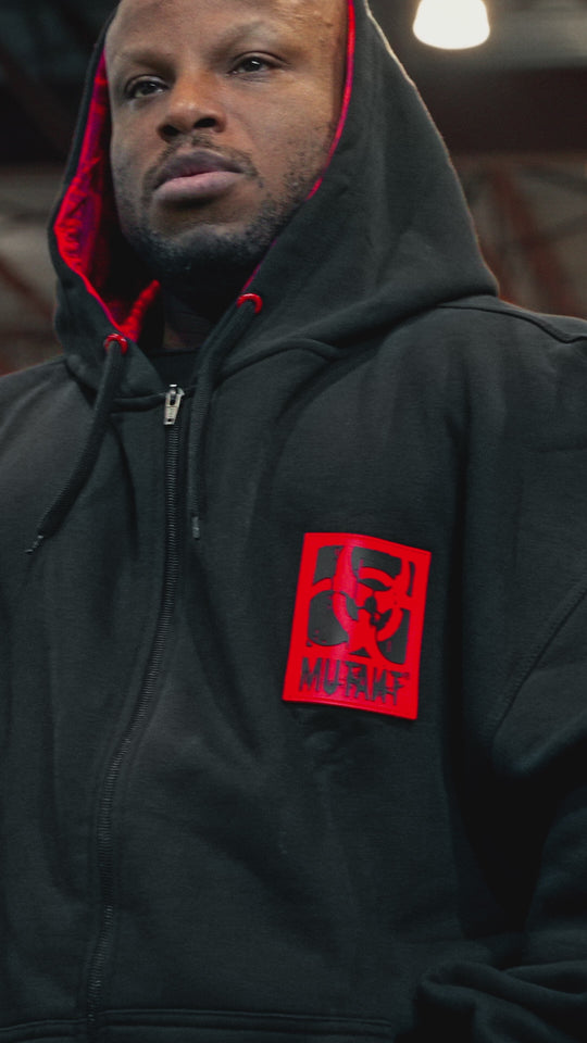 Video featuring Mutant athletes Shaun Clarida, Dusty Hanshaw, and Jamie Christian wearing the Mutant Patched Zip-Up Gym Hoodie in black, grey, and red colors.