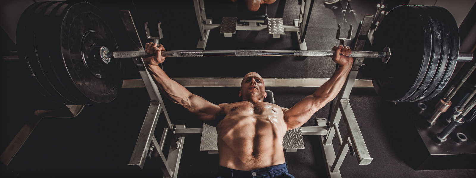 Bodybuilder Bench Pressing