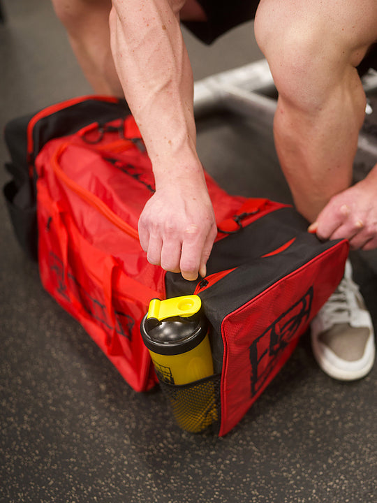 MUTANT® BORN HARDCORE Duffle Gym Bag (Red, Black Edge)